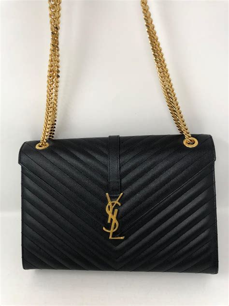 black and gold ysl purse|ysl purse all black.